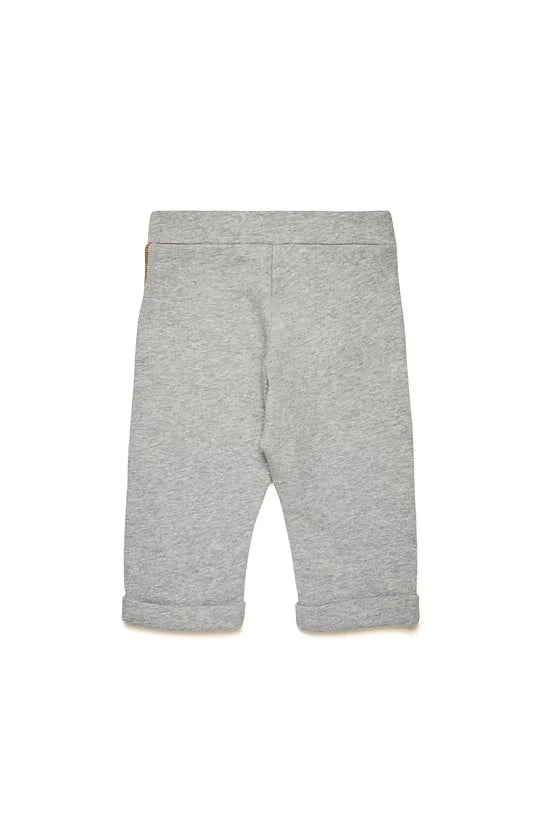 Trousers with denim pockets