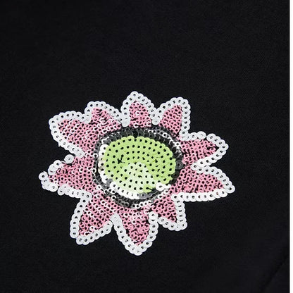 Wide trousers with sequined flowers