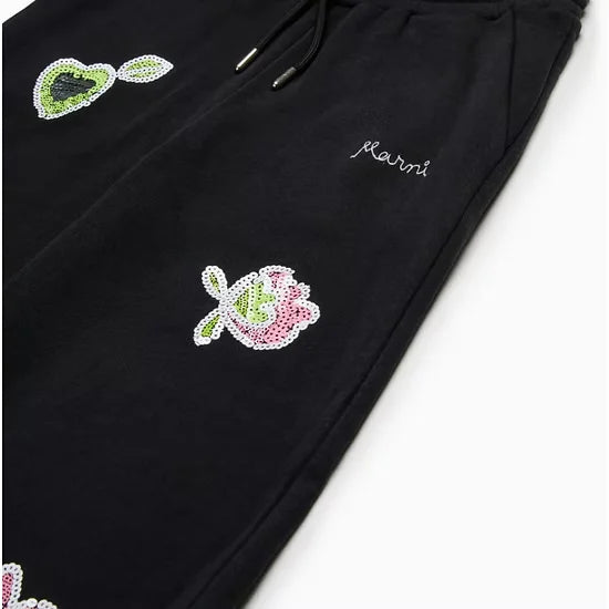 Wide trousers with sequined flowers